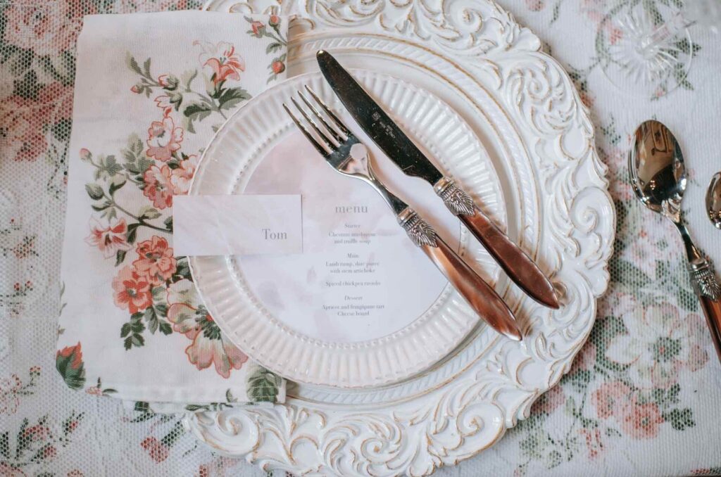 A plate, cutlery and charger plate at Bilsington Priory