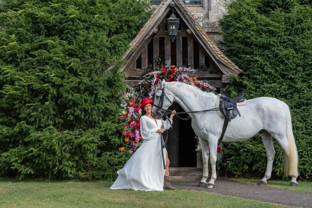 The oak framed Porch with a bride and a horse
