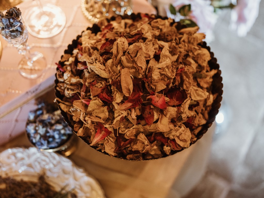 A bowl of real flowers confetti in a bowl on a confetti bar in the lobby of Bilsington Priory near Canterbury