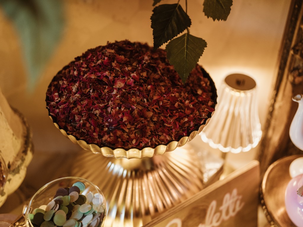A bowl of real flowers confetti on a confetti bar in the lobby of Bilsington Priory near Folkestone
